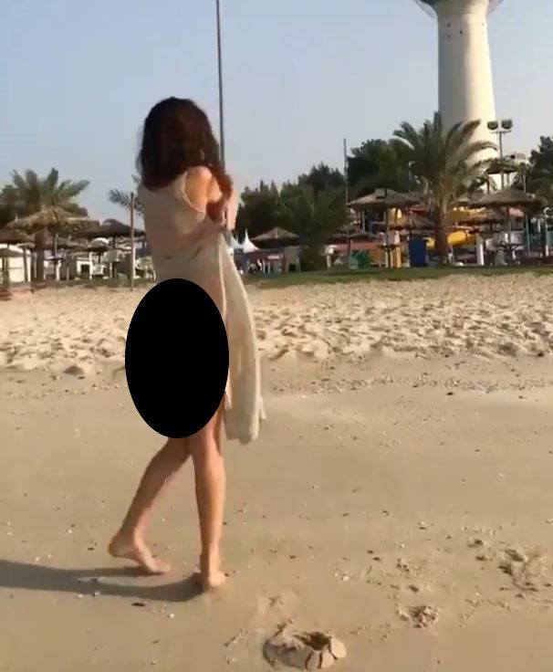 شاهدوا فتاة تتعرى أمام أبراج الكويت.. وتثير موجة غضب واسعة
