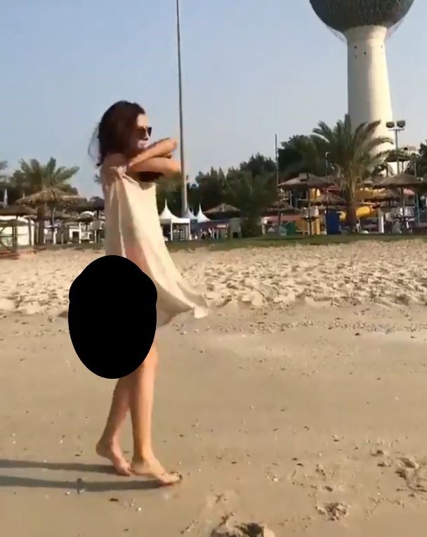 شاهدوا فتاة تتعرى أمام أبراج الكويت.. وتثير موجة غضب واسعة
