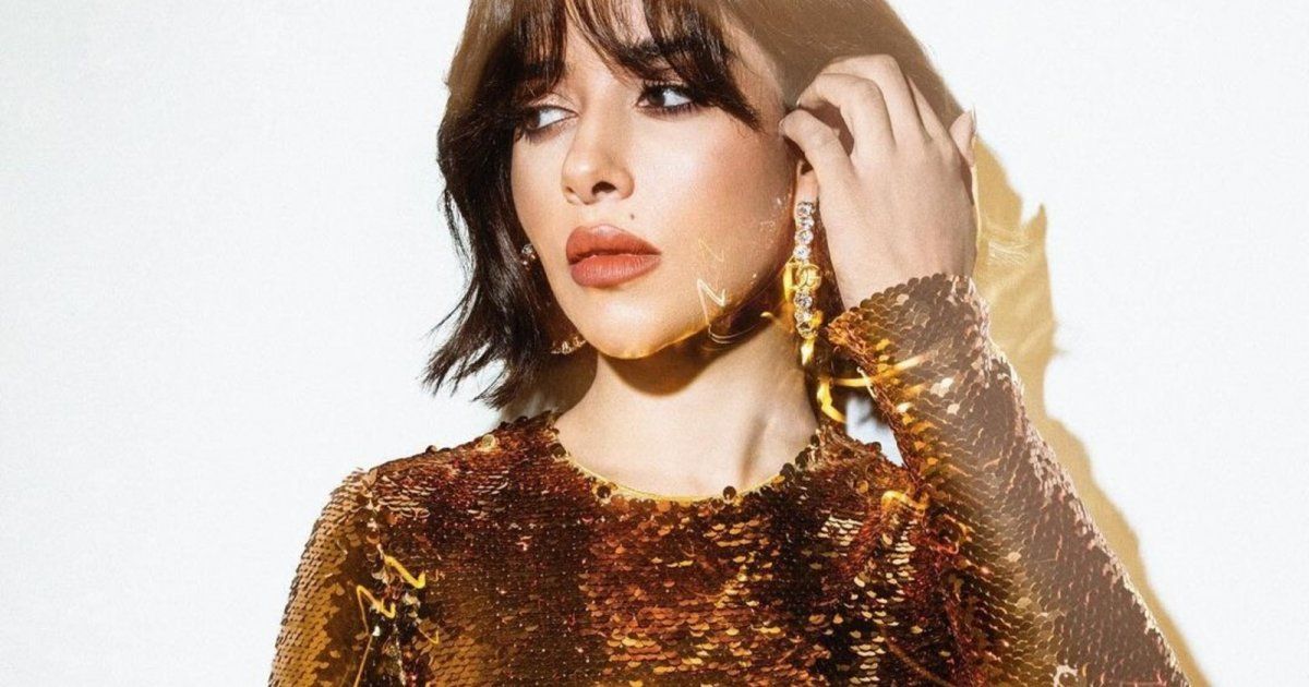 سعر مرتفع لفستان بلقيس الذهبي الذي تألقت به ليلة رأس السنة .. من دار Dolce & Gabbana