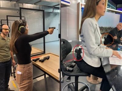 تراند اليوم : شاهد: مذيعة إسرائيلية تتسلح بمسدس على خصرها وتظهر به على الهواء مباشرة داخل الاستوديو!