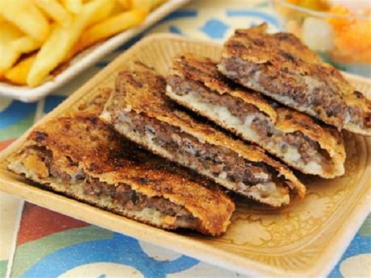 هذا ما يحدث لجسمك والكوليسترول عند تناول رغيف حواوشي.. لن تتوقع