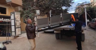 إيقاف أعمال بناء مخالف والتحفظ على 10 سيارات فان تعمل دون ترخيص بحدائق الأهرام