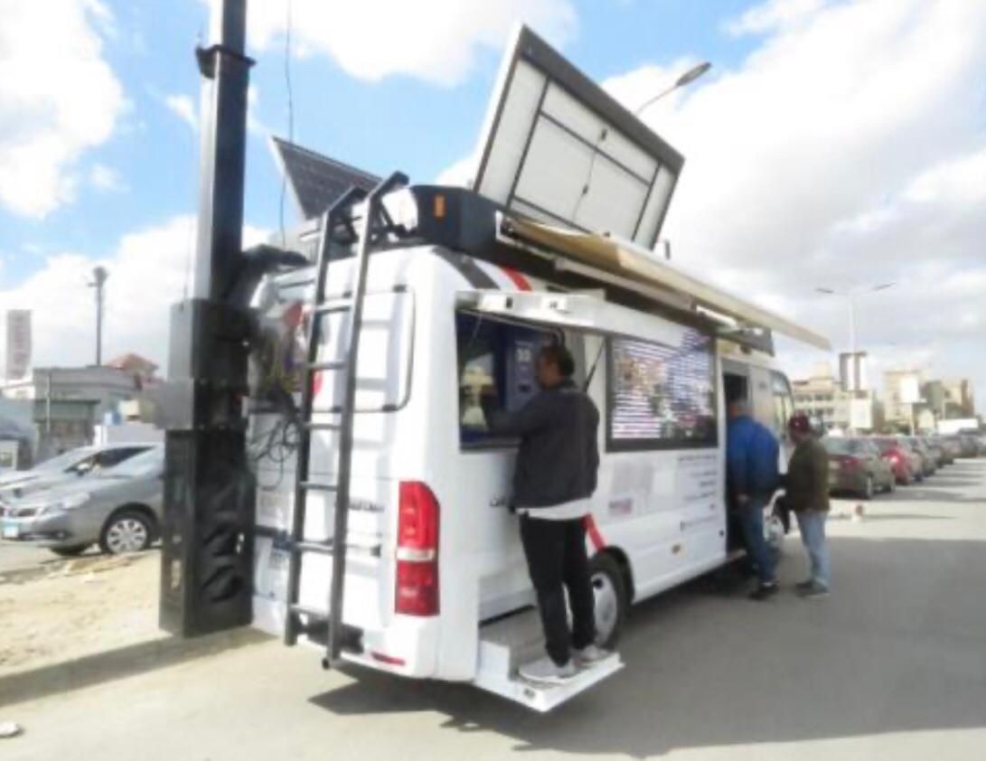 الدفع بسيارات أحوال اكسبرس بالمولات لاستخراج وثائق فورية للمواطنين.. صور