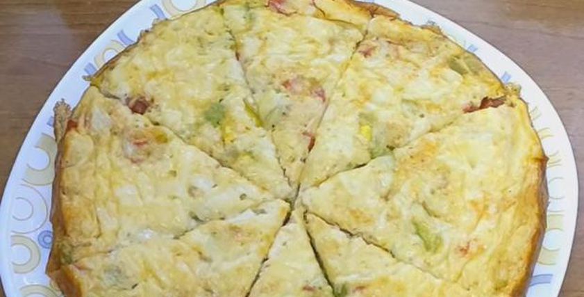طريقة عمل «البيتزا الكدابة» بنصف كوب من الحليب .. حضريها في دقائق