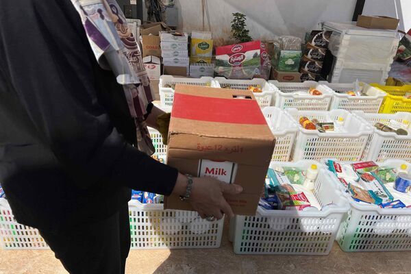 حملة "دينار لتجهيز سلة رمضان" في ليبيا... صور