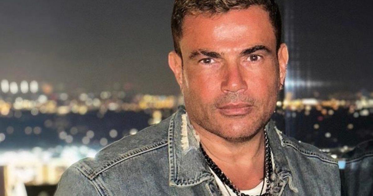 عمرو دياب برفقة سالم الدوسري بعد مباراة الأهلي والزمالك - بالصورة