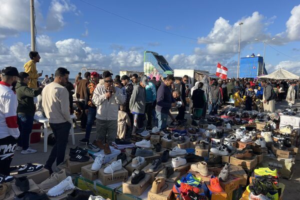 سوق "الحوت" عادة رمضانية ثابتة في مدينة بنغازي الليبية... صور