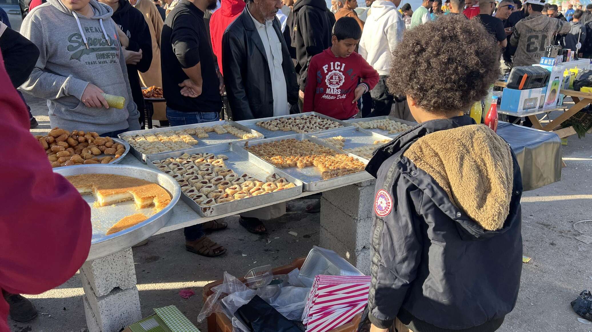 سوق "الحوت" عادة رمضانية ثابتة في مدينة بنغازي الليبية... صور