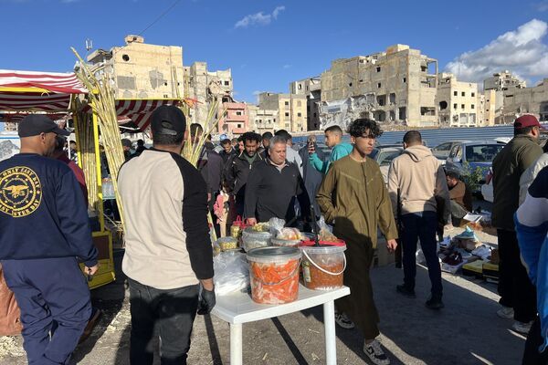 سوق "الحوت" عادة رمضانية ثابتة في مدينة بنغازي الليبية... صور