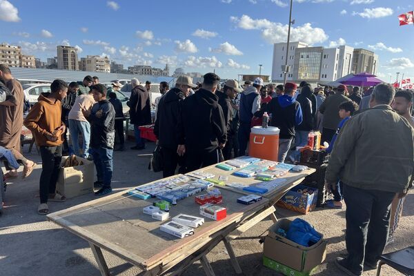 سوق "الحوت" عادة رمضانية ثابتة في مدينة بنغازي الليبية... صور