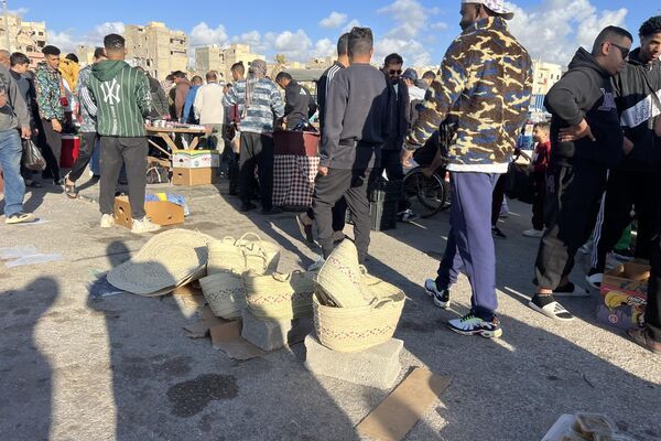 سوق "الحوت" عادة رمضانية ثابتة في مدينة بنغازي الليبية... صور