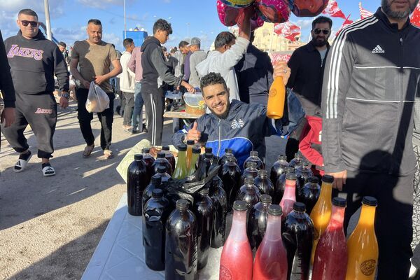 سوق "الحوت" عادة رمضانية ثابتة في مدينة بنغازي الليبية... صور