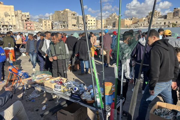 سوق "الحوت" عادة رمضانية ثابتة في مدينة بنغازي الليبية... صور