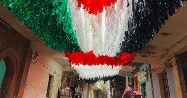 فيها حاجة حلوة.. أهالى منشأة البكارى عملوا زينة رمضان بعلم مصر وفلسطين