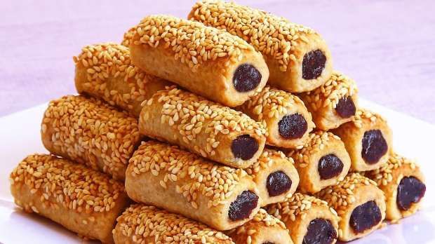 بخطوات بسيطة.. حضري أصابع العجوة بالسمسم في المنزل