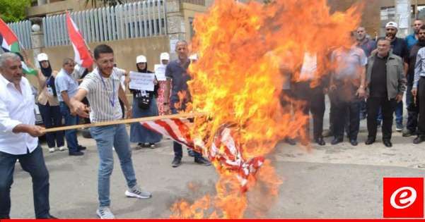 اعتصام أمام مبنى نقابة محامي طرابلس رفضا لاستضافتها ندوة ممولة من وكالة التنمية الأميركية