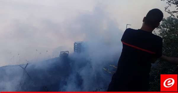 احتراق مساحة شاسعة من الاعشاب والاشجار والبلان واكوام من الاخشاب في بوارج