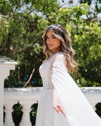 ملك أحمد زاهر بفستان أبيض كالعروس