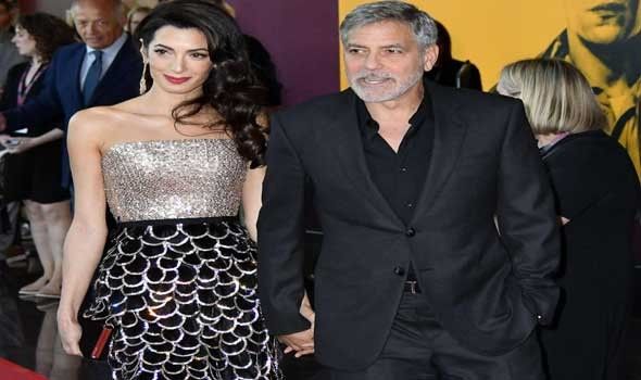 أمل كلوني وحبيبة براد بيت يشعلان السجادة الحمراء في مهرجان فينيسيا