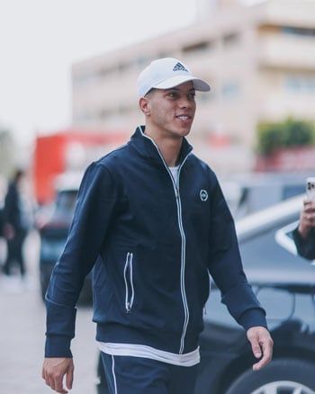 "ضحكة أفشة وبن شرقي" الأبرز فى إطلالات نجوم الأهلى بالتتش