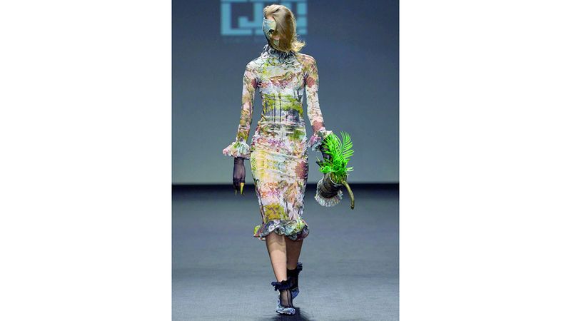 الامارات | أسبوع دبي للموضة.. النخيل يترك نقوشه على الأزياء الناعمة