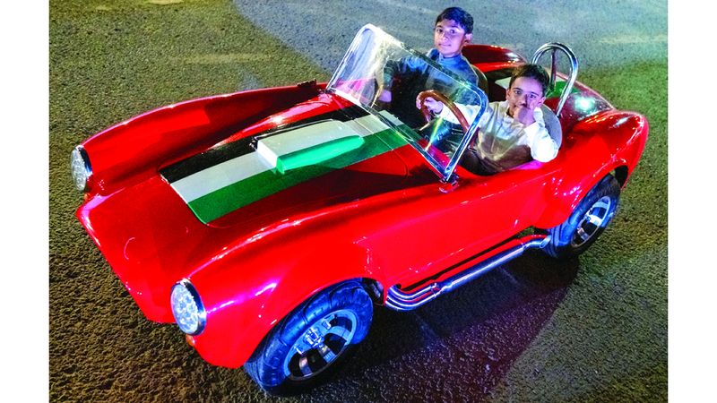 الامارات | سوّاقون صغار.. في مهرجان «السيارات القديمة»