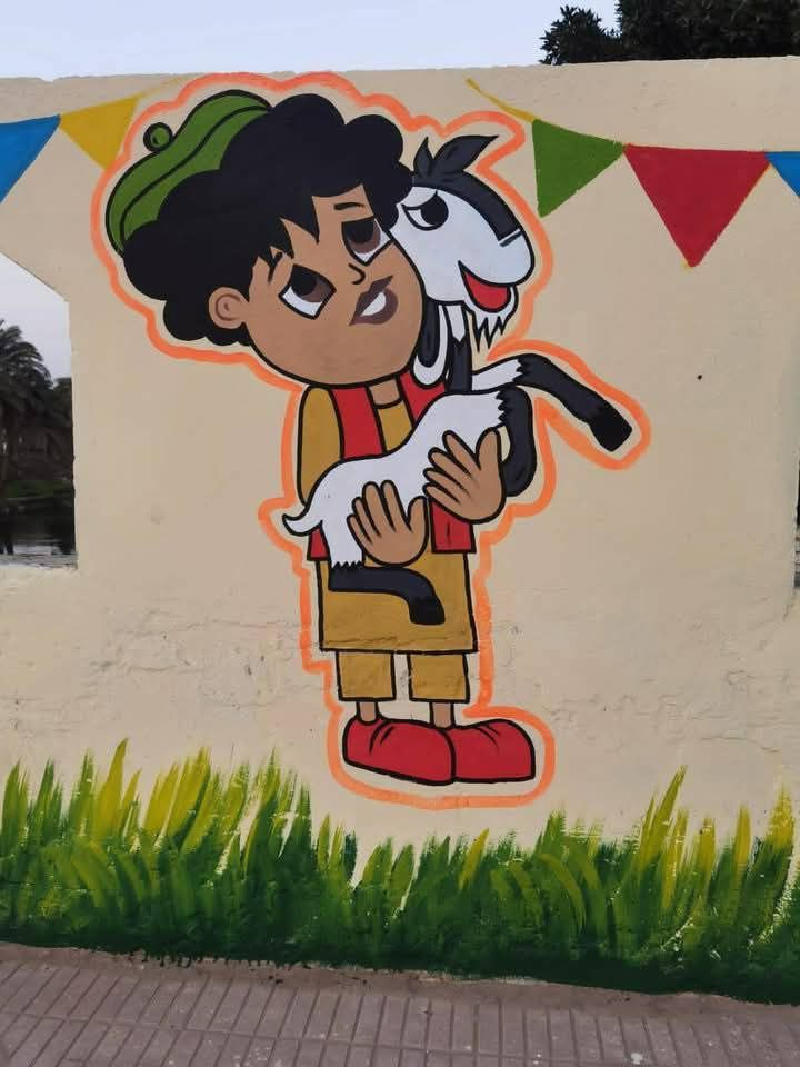 أهالى بهبيت يجملون مدخل قريتهم بجداريات فنية لاستقبال شهر رمضان.. صور