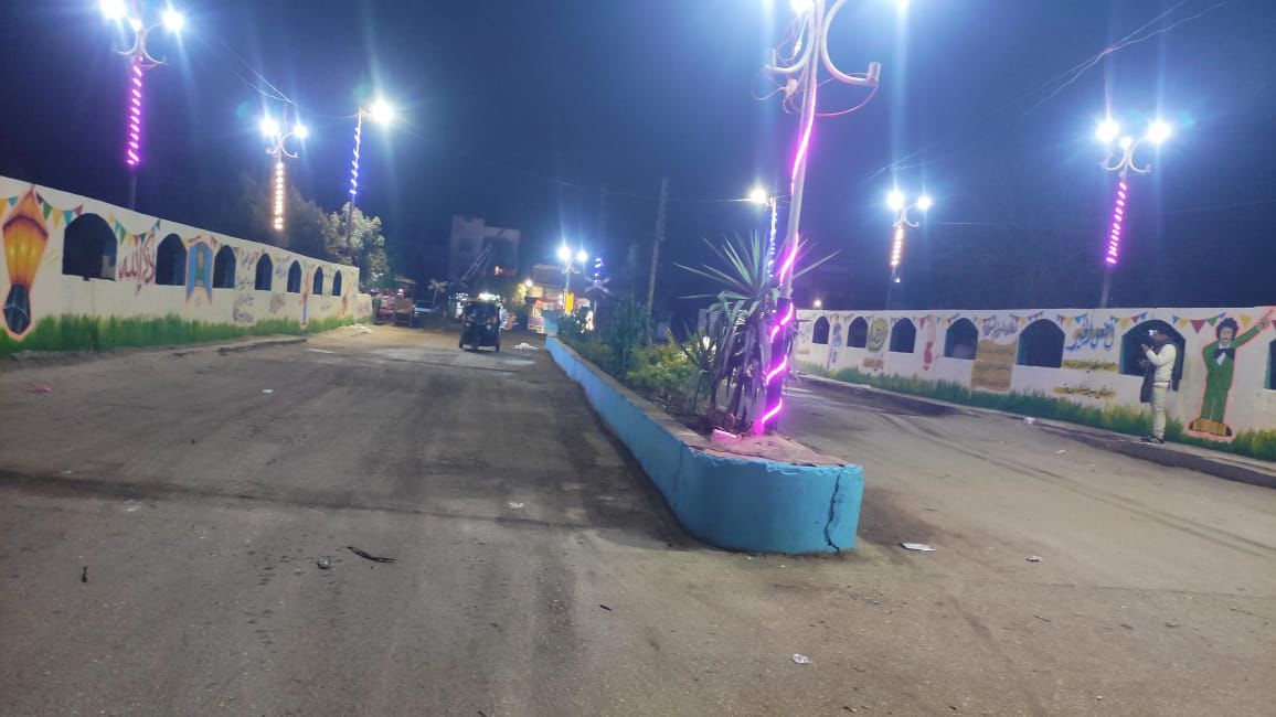 أهالى بهبيت يجملون مدخل قريتهم بجداريات فنية لاستقبال شهر رمضان.. صور