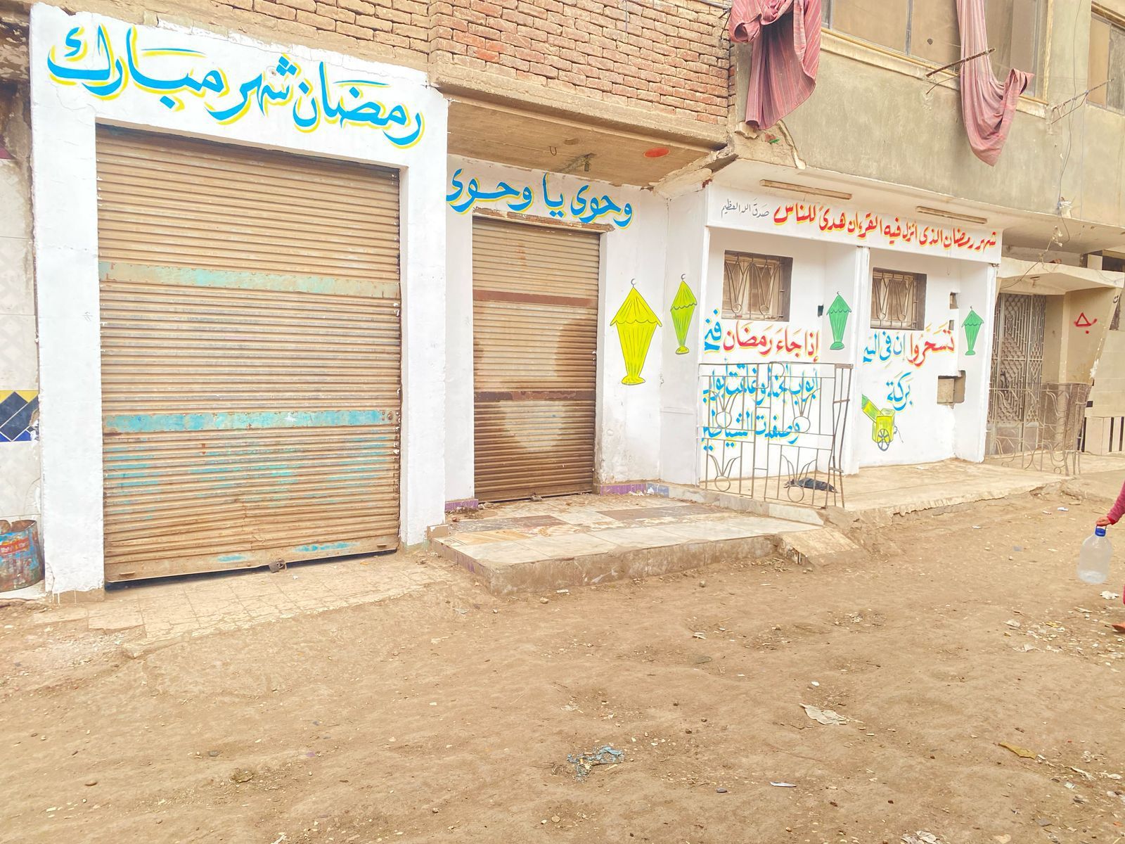 شوارع قرية المنوات فى الجيزة لوحة فنية لاستقبال شهر رمضان الكريم.. صور