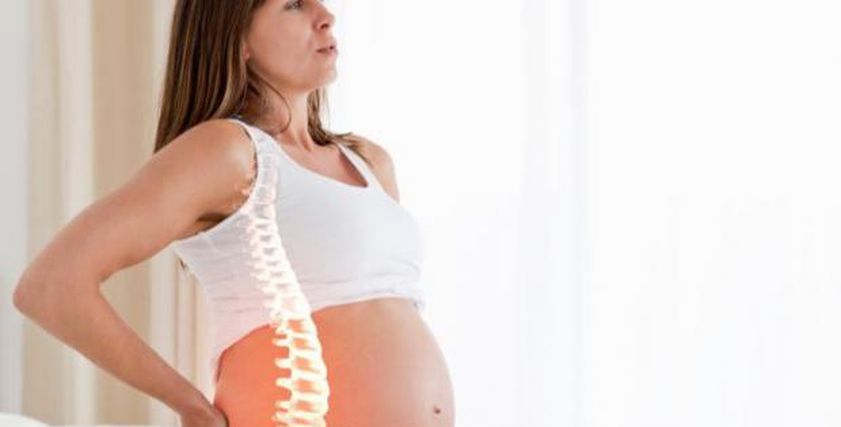 آلام الظهر في الحمل.. إزاي تتجنبيها وتحافظي على صحة عمودك الفقري؟