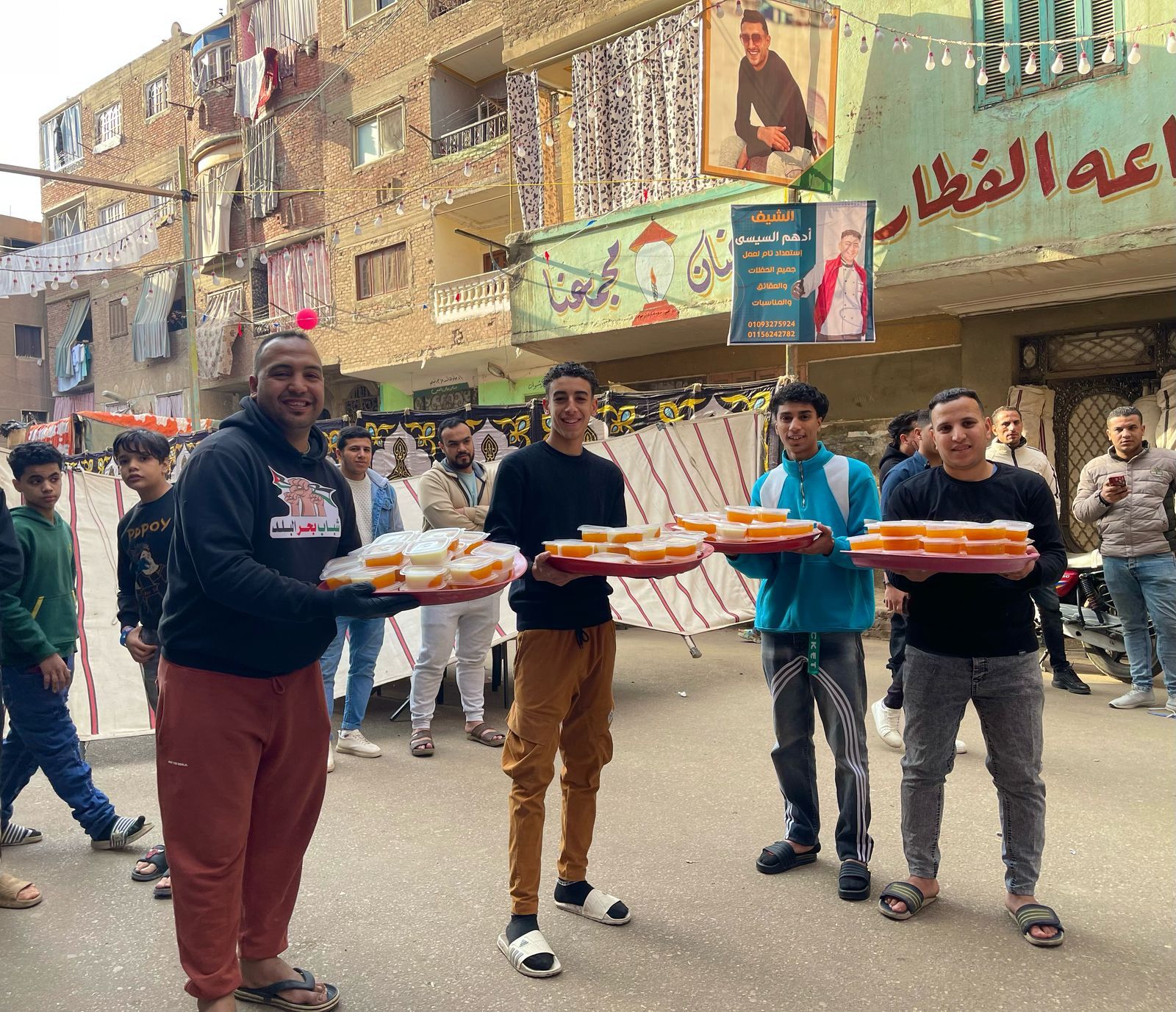 الوراق بتفرح.. أهالى بحر البلد يجتمعون على سفرة إفطار واحدة