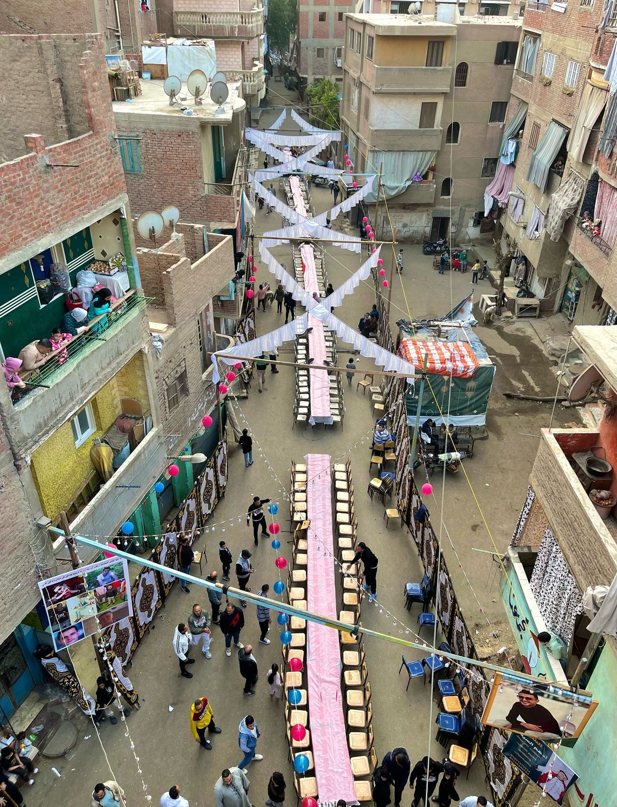 الوراق بتفرح.. أهالى بحر البلد يجتمعون على سفرة إفطار واحدة