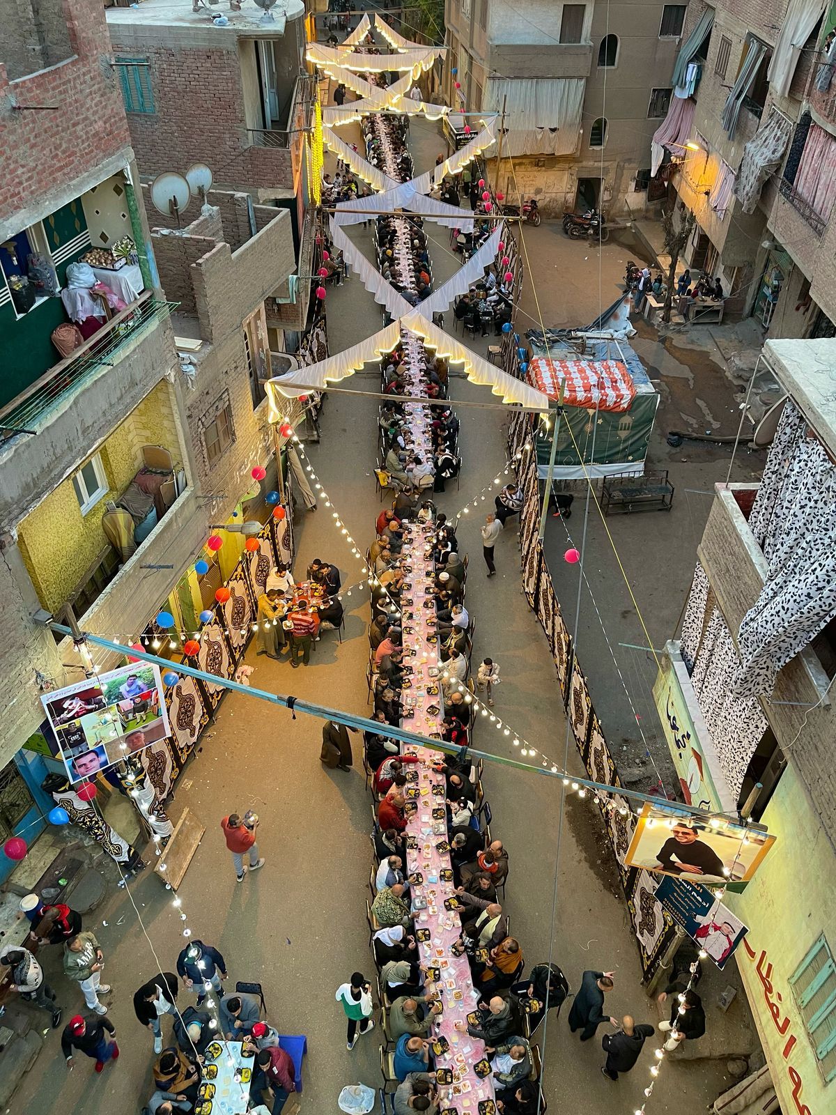 الوراق بتفرح.. أهالى بحر البلد يجتمعون على سفرة إفطار واحدة