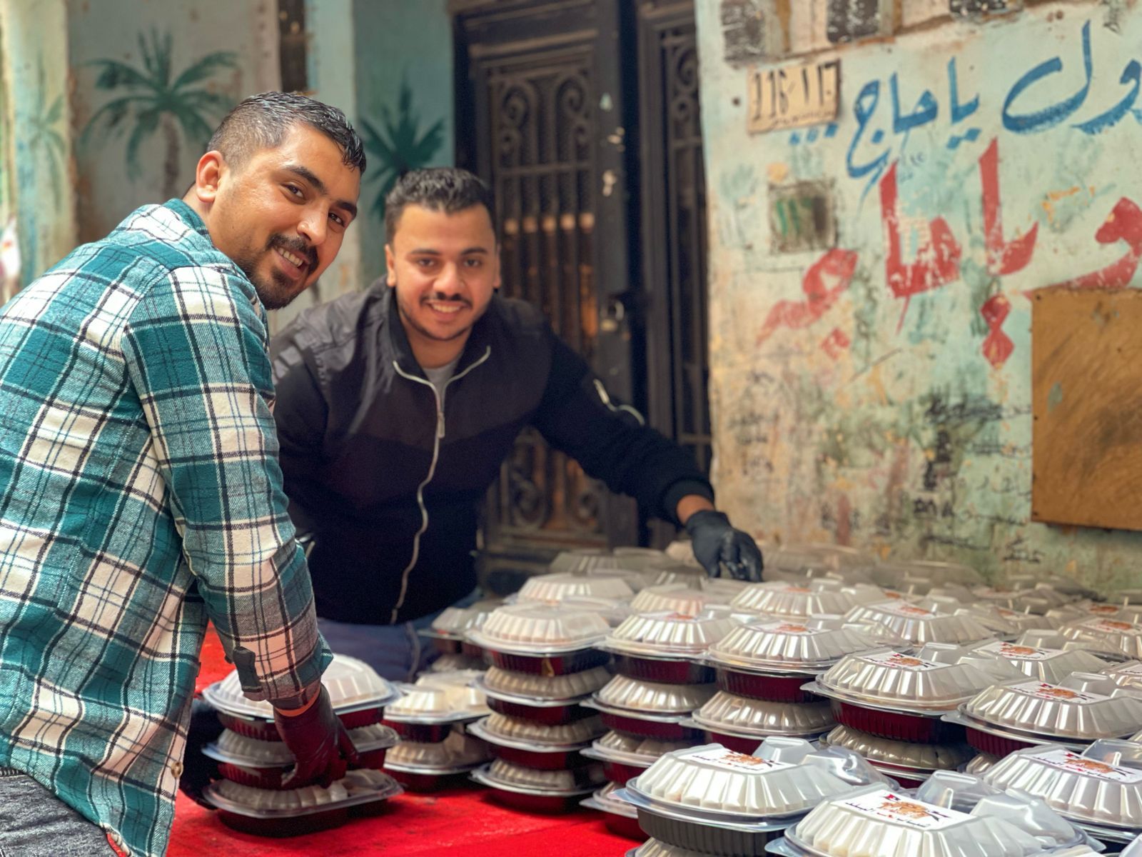 الوراق بتفرح.. أهالى بحر البلد يجتمعون على سفرة إفطار واحدة