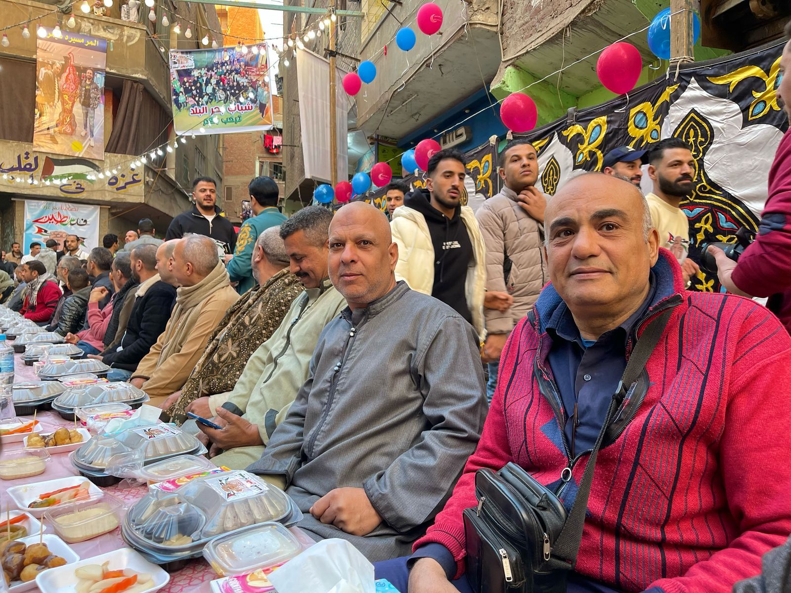 الوراق بتفرح.. أهالى بحر البلد يجتمعون على سفرة إفطار واحدة