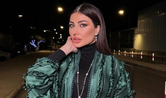 هبة نور تتالق بلوك رمضاني فاخر من امام برج خليفة