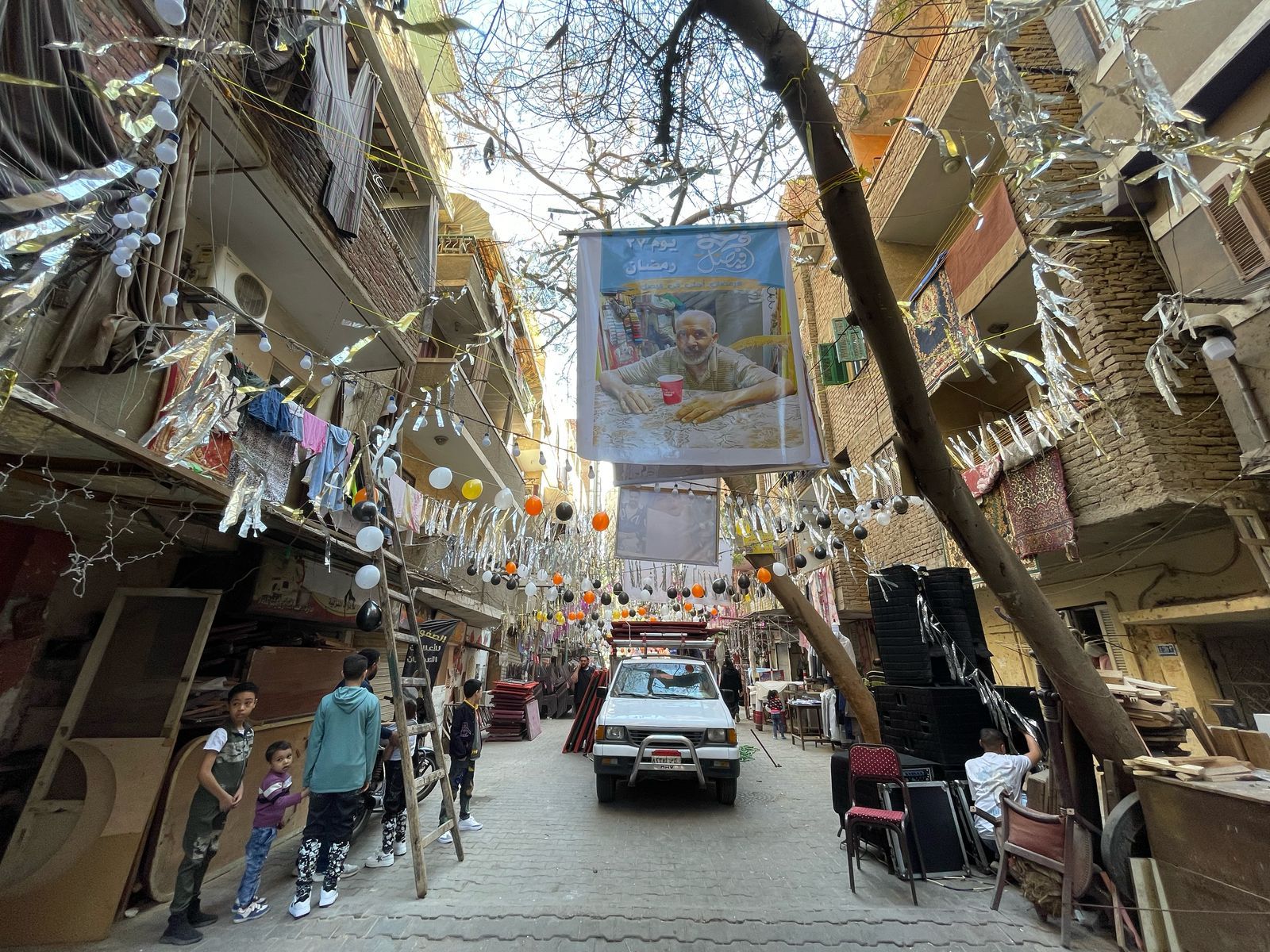 للعام الرابع بامتداد 18 شارعا.. أهالى فيصل ينظمون مائدة إفطار رمضانية.. صور