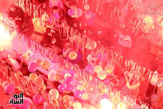 فيصل بتفرح.. الأهالى ينظمون مائدة رمضانية ضخمة بطول 18 شارعا.. صور