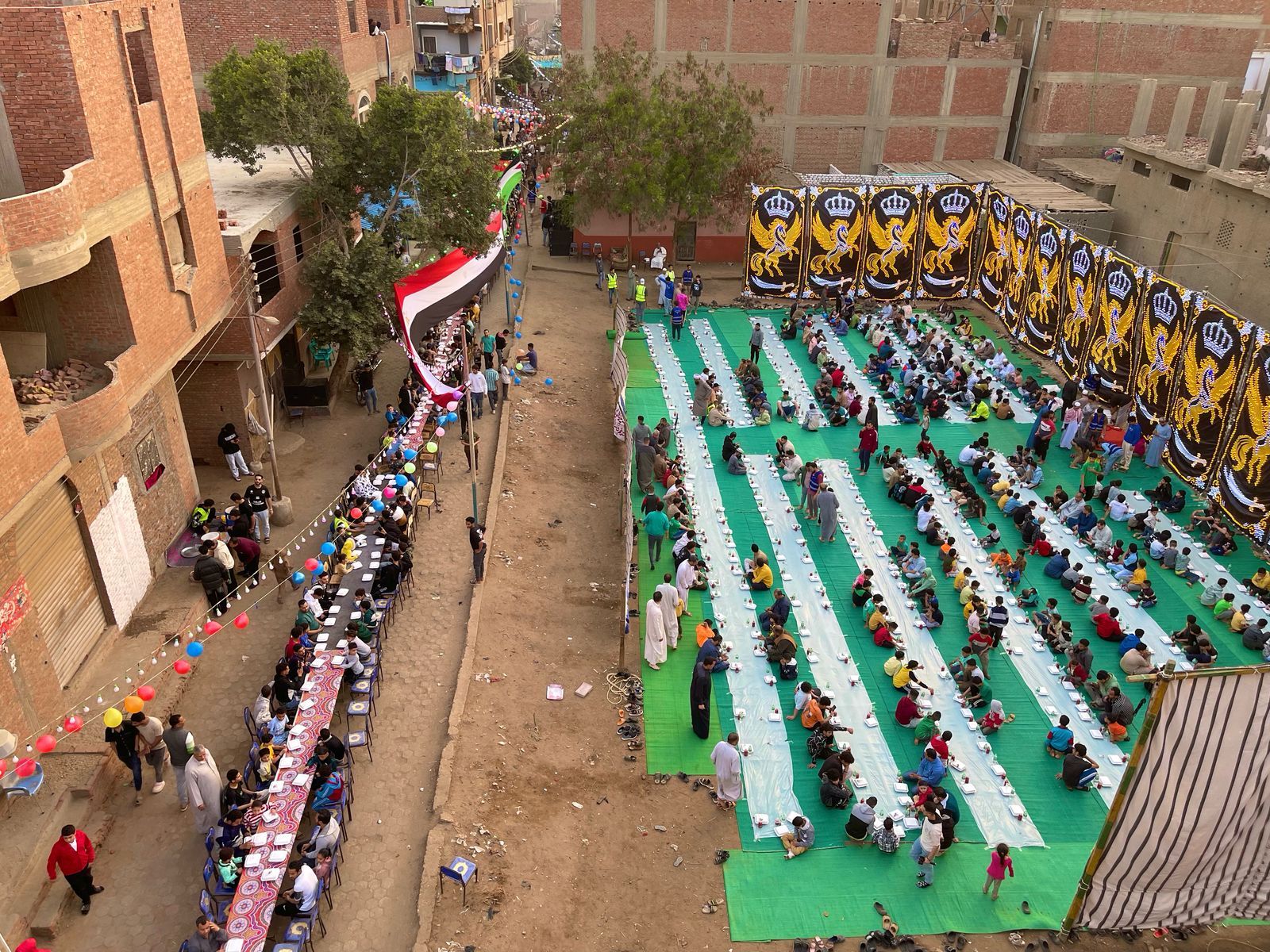 جزيرة الوراق بتفرح.. الأهالى يجهزون مائدة إفطار جماعى للعام الرابع.. صور