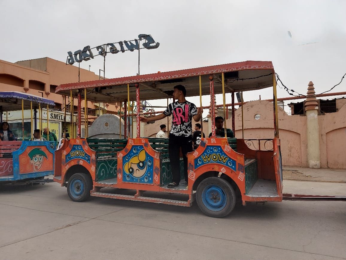 "الطفطف" ينشر البهجة بين زوار الحديقة الدولية فى ثانى أيام العيد.. صور