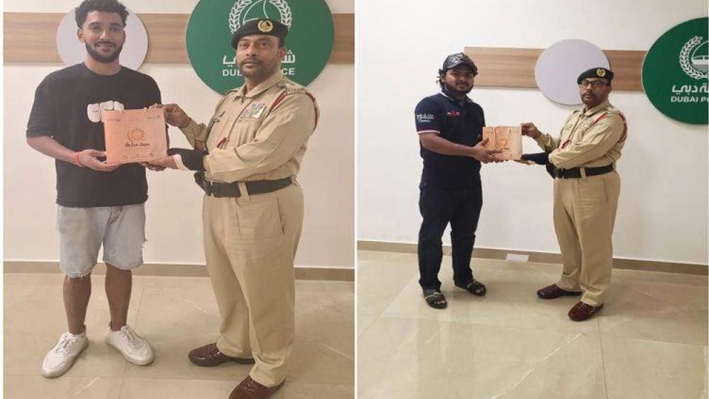 الامارات | شرطة دبي تُشيد بأمانة مُقيمين سلما مبلغاً مالياً وقطعة مجوهرات