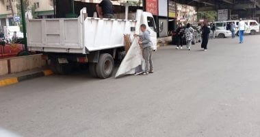رفع إشغالات للباعة الجائلين والمنشآت التجارية خلال حملات فى الدقى