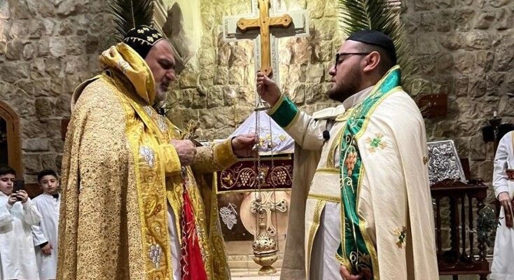 المطران سفر احتفل بالقداس الإلهي في كنيسة مار جرجس بمناسبة عيد الشعانين