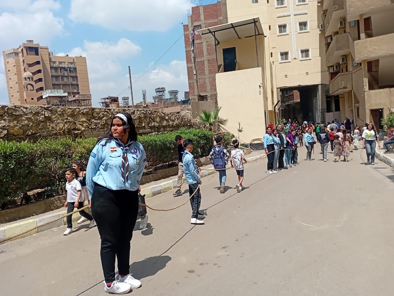 فرسان الخدمة فى أحد السعف.. اعرف جهود فريق الكشافة بدير سمعان في تنظيم الحفل