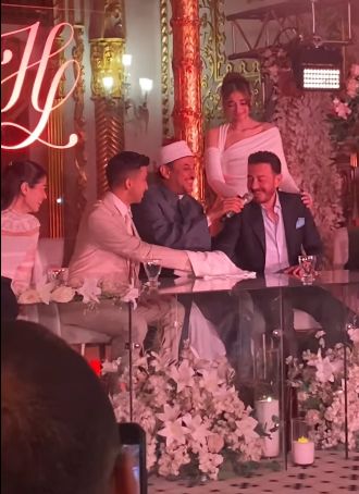 دموع الفرح تسيطر على عقد قران هشام جمال وليلى زاهر .. فيديو وصور