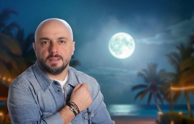 "شو هالقمر".. كارلوس يطرح أغنيته الصيفية بأجواء فرح