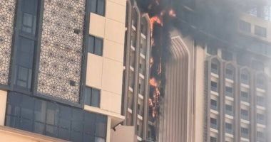 حريق يلتهم فندق "قلب العالم" وسط بغداد.. صور