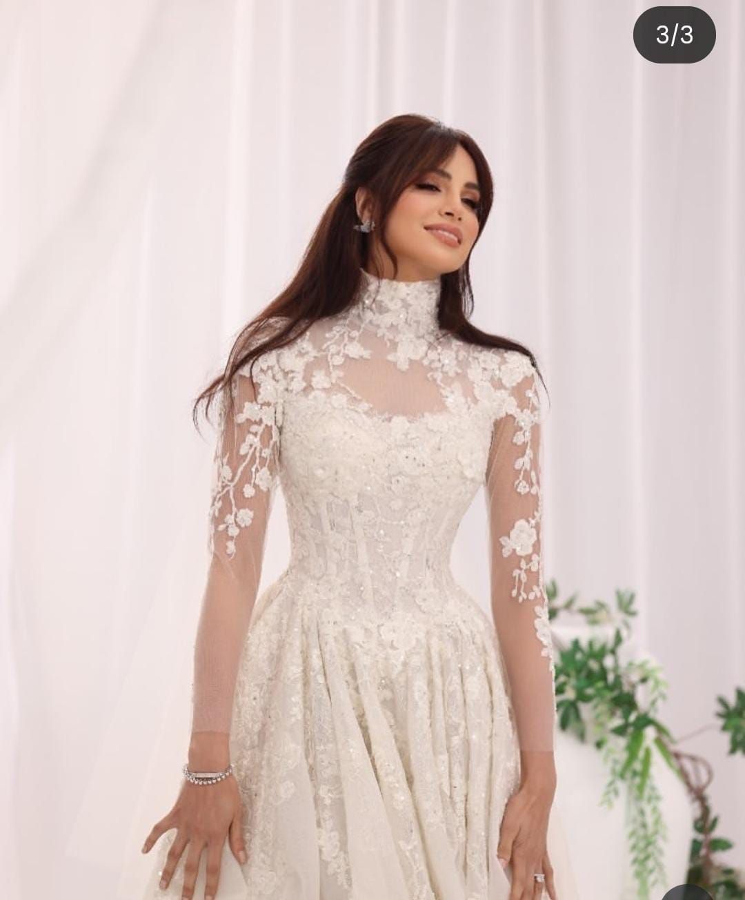 آمال ماهر تثير الجدل بظهورها مرتدية فستان زفاف