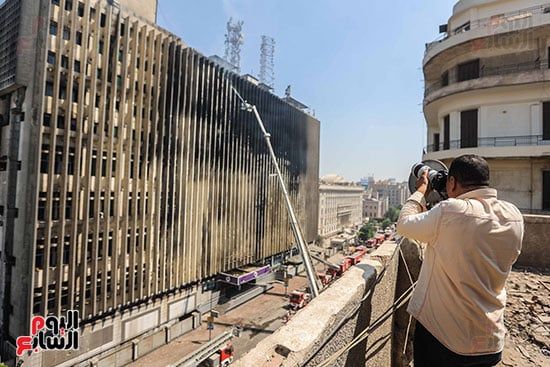 النيابة العامة تباشر التحقيق فى أسباب حريق سنترال رمسيس.. صور
