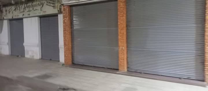 رصف ميدان المطبعة وإزالة مخالفات بناء بحي دار السلام